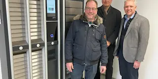 Bild von drei Personen