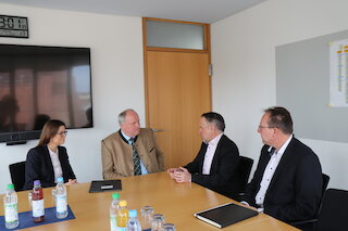 Foto von vier Personen